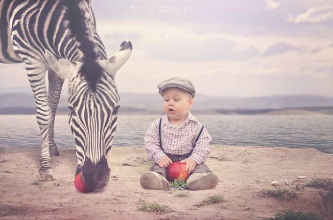 bimbo con zebra
