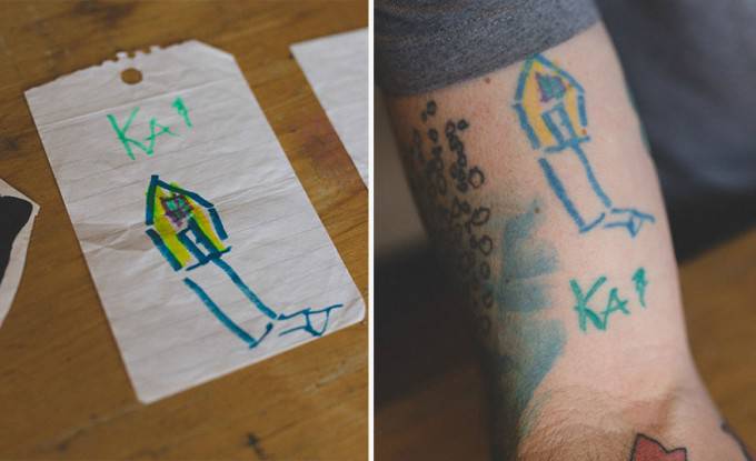 casa disegno e tatuaggio su braccio